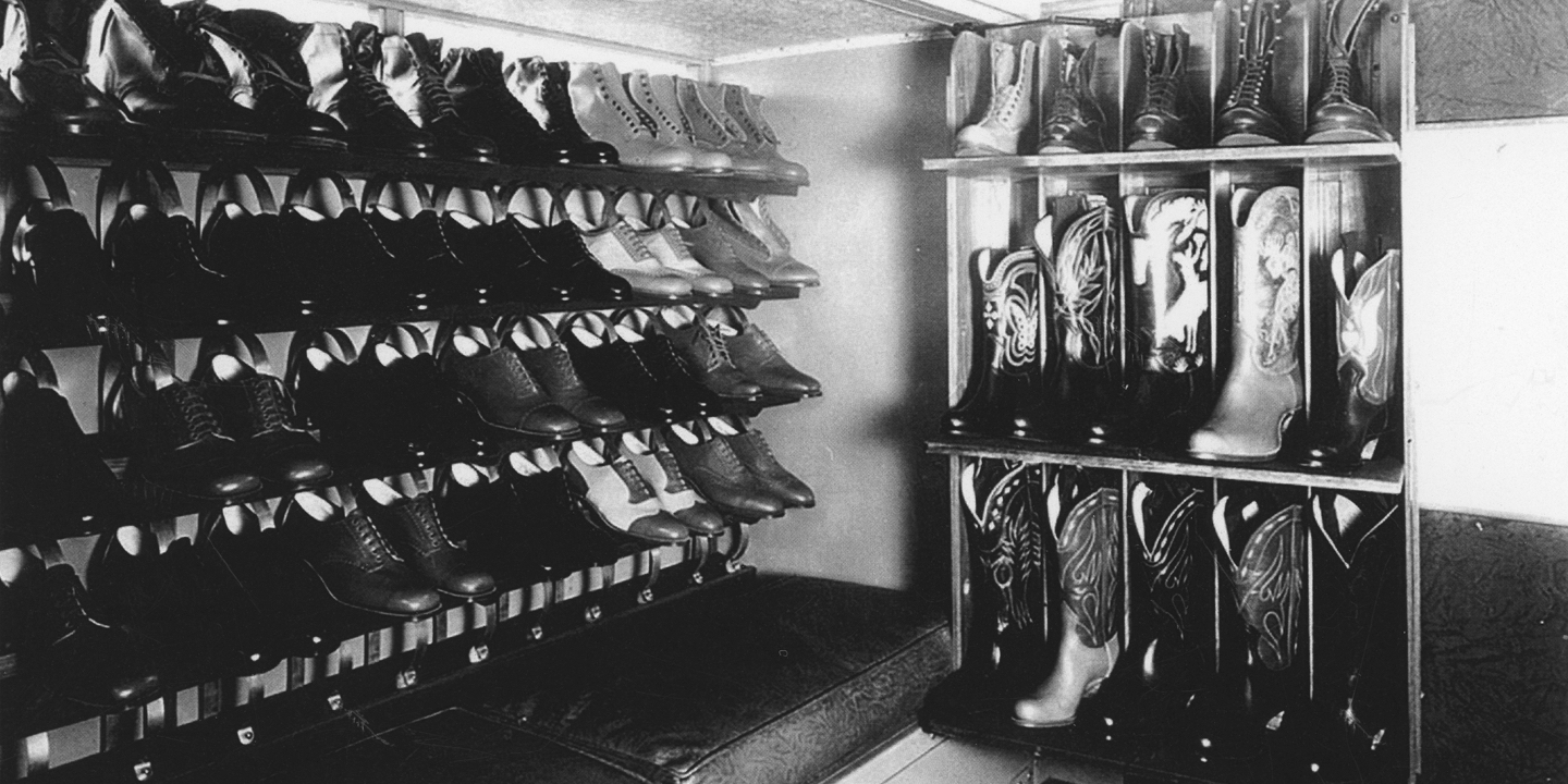 The inside of the Justin display truck, with racks for boots.